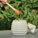Honingpot met houten lepel